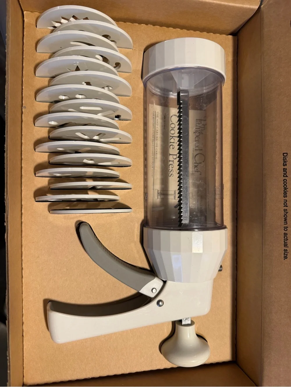 The Pampered Chef Brown and Black Cookie Press Packaging